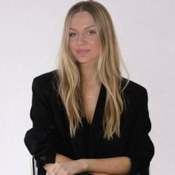 Randine H., Marketing and Graphic Design at ClaimWrit